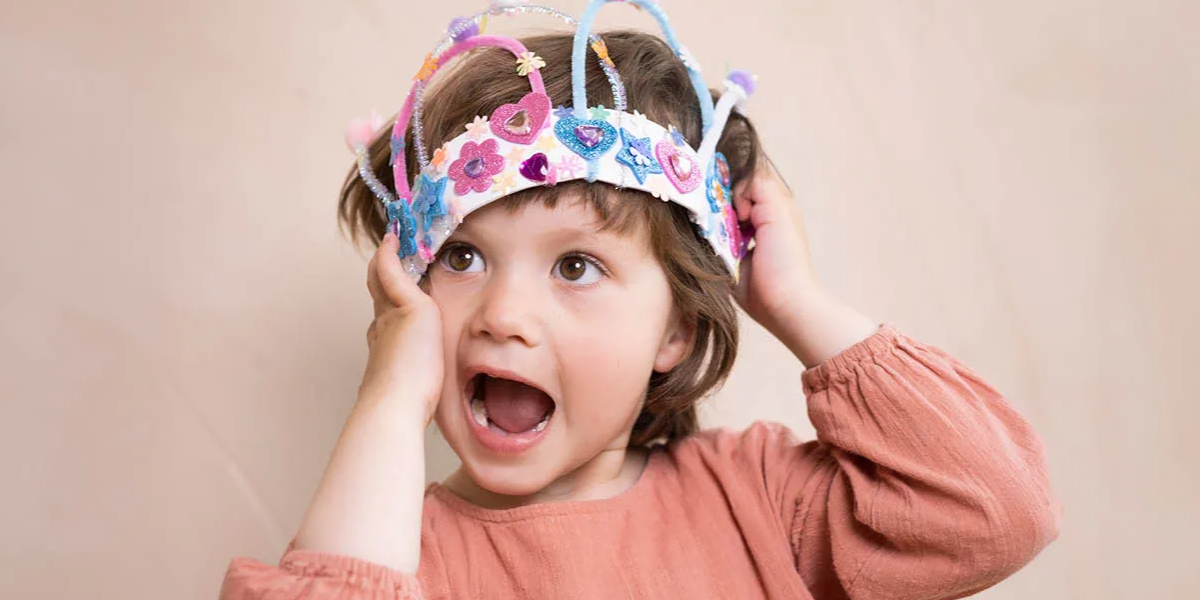 Little girl with arts and craft crown