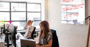 employees at work at their desks